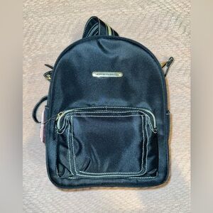 Stone Mountain five Way Backpack with Gold Accents. Adjustable straps.